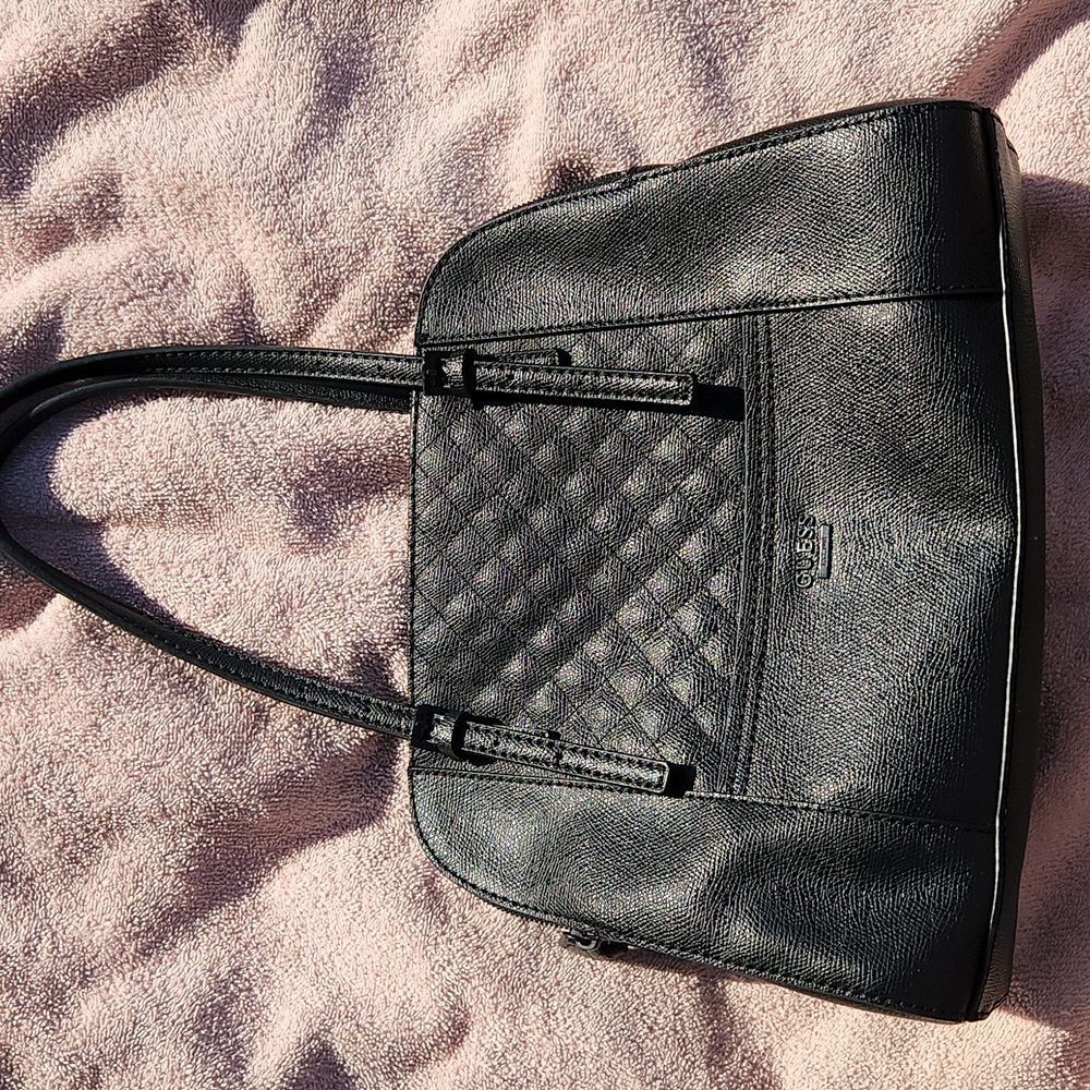 Black medium sized Guess hand bag